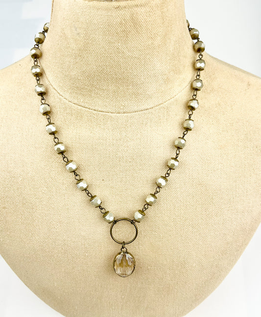 18" - 20" Ivory Necklace with Round Metal & Crystal Pendant