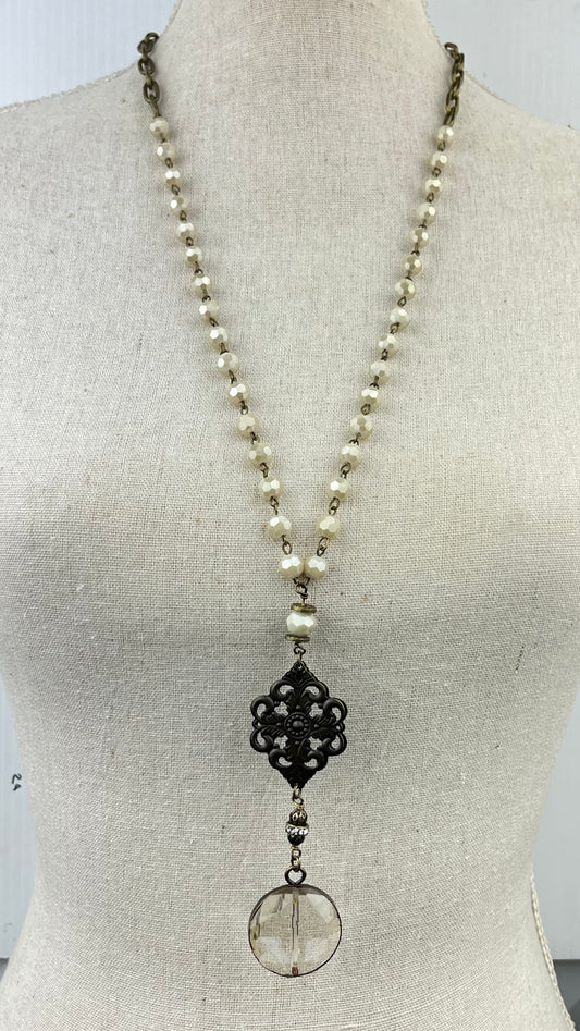 NE2715 Ivory Necklace with Metal and Round Crystal Pendant